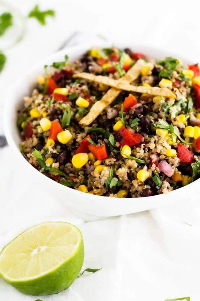 Close up shot of Southwestern Quinoa Salad in a white bowl.