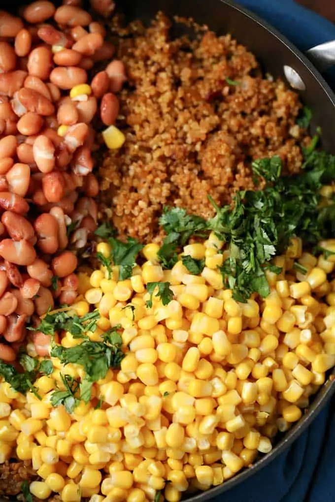 Photo of quinoa beans and corn in a skillet.