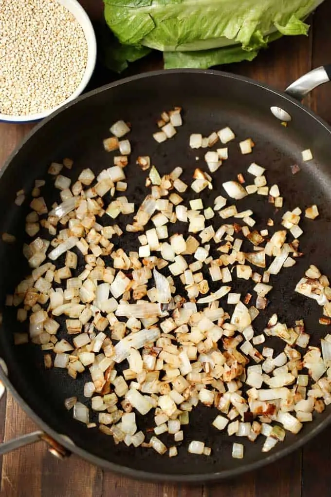 Photo of onions in a saute pan.