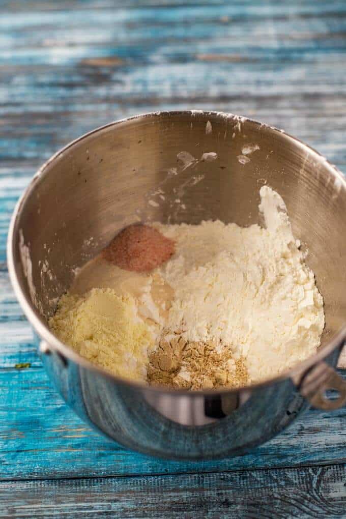 Photo of dry ingredients in a mixing bowl for a quinoa bread recipe.