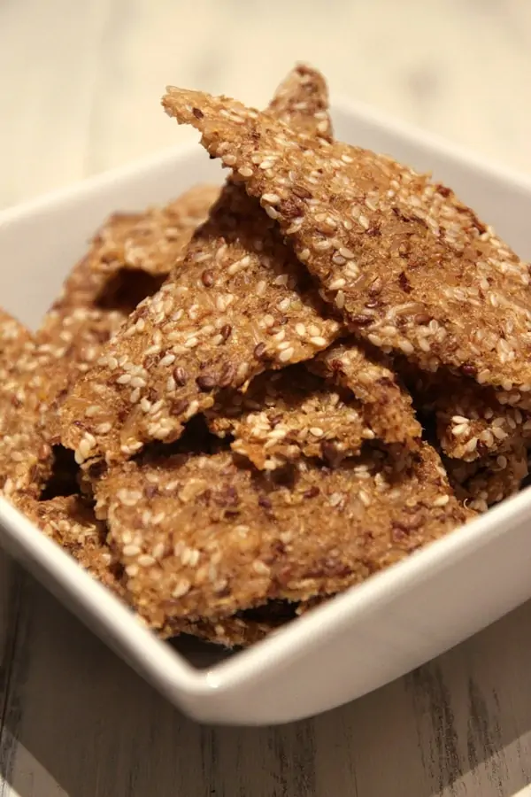 Quinoa Brown Rice Sesame Crackers - These easy to make crackers are packed with nutrients - brown rice, quinoa, sesame seeds and flax! A great way to save money while sticking to your healthy eating plans. - WendyPolisi.com