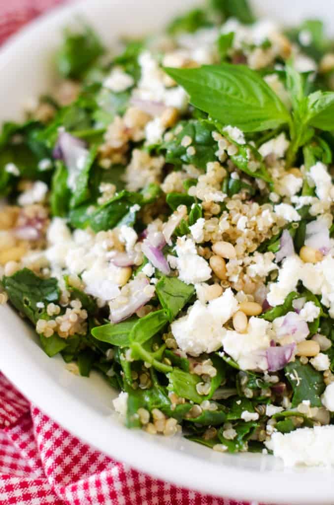 This Spinach Quinoa Salad with Feta and Pine Nuts is simple to make and makes a great side dish or vegetarian main course.
