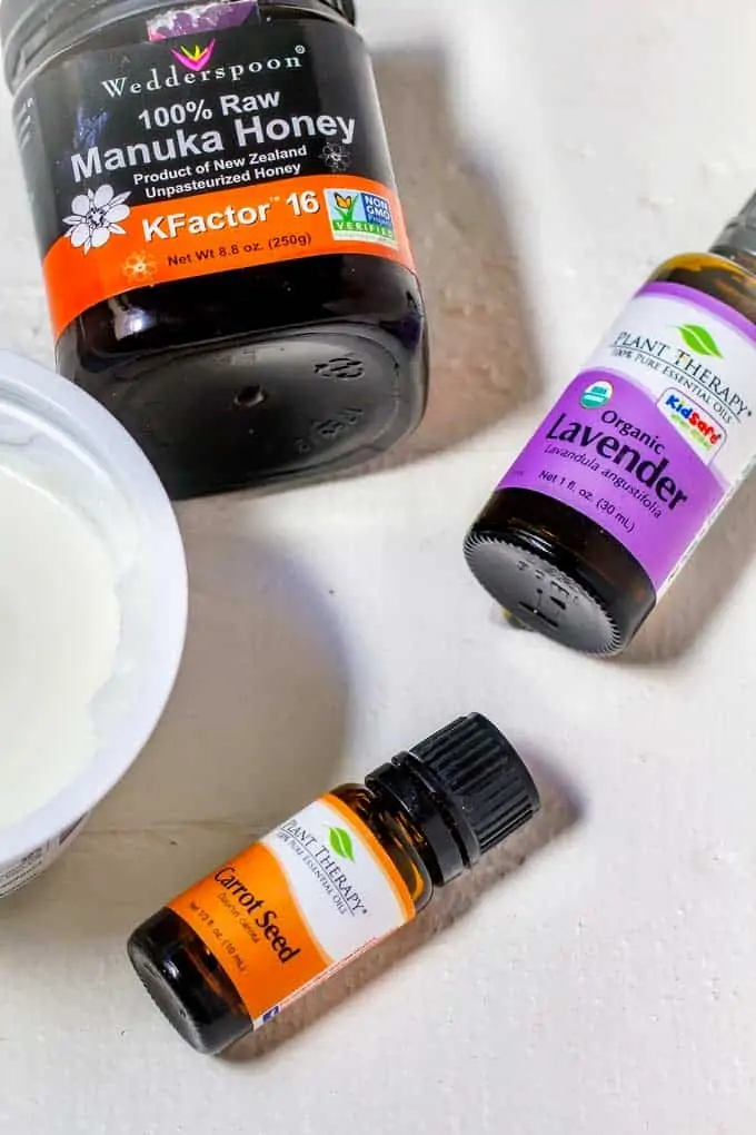 DIY Honey Face Mask ingredients - Carrot Seed Essential Oil, Lavender Essential Oil, Honey and Yogurt