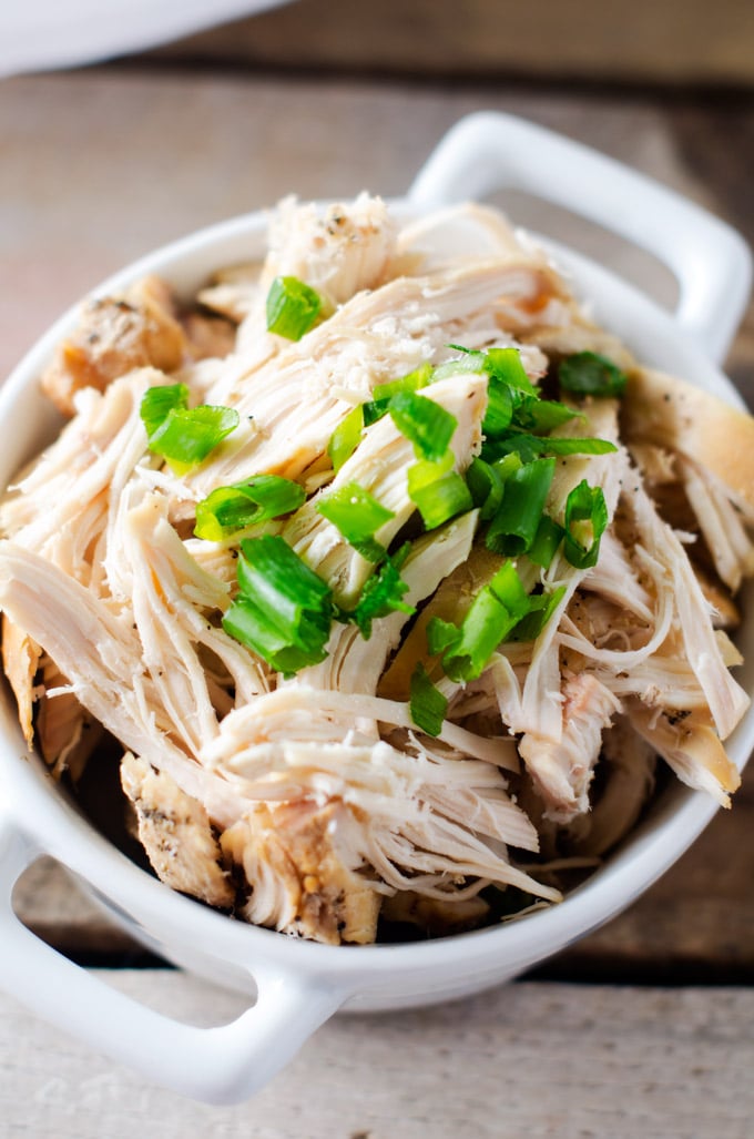 Easy Slow Cooker Shredded Chicken - This easy crockpot recipe helps you put healthy eating on auto-pilot. I love to make it on the weekends so that I have shredded chicken on hand to toss into salads, grain bowls, pasta dishes and burritos.