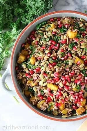 Photo of Harvest Wild Rice Salad in a red and white bowl.