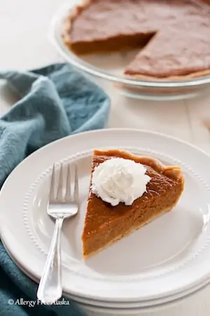 Photo of a slice of a Dairy Free Maple Pumpkin Pie.