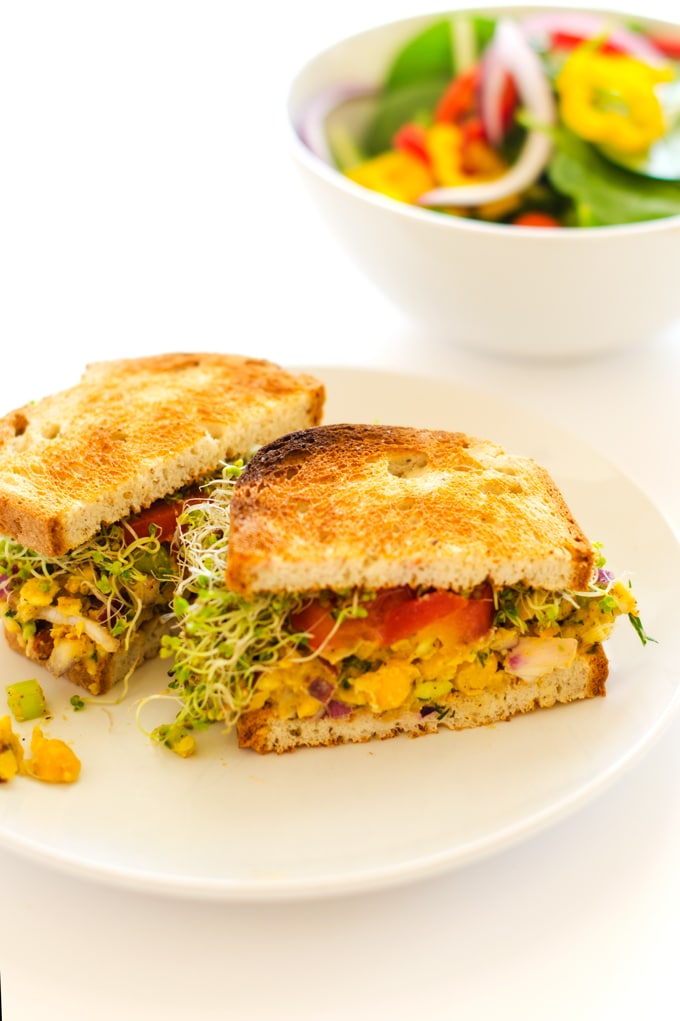 Avocado Chickpea Sandwiches with Smokey Almonds - This vegan and gluten free sandwich will have you not missing the meat! Keeps well in the fridge, making it the perfect weekday lunch! - WendyPolisi.com