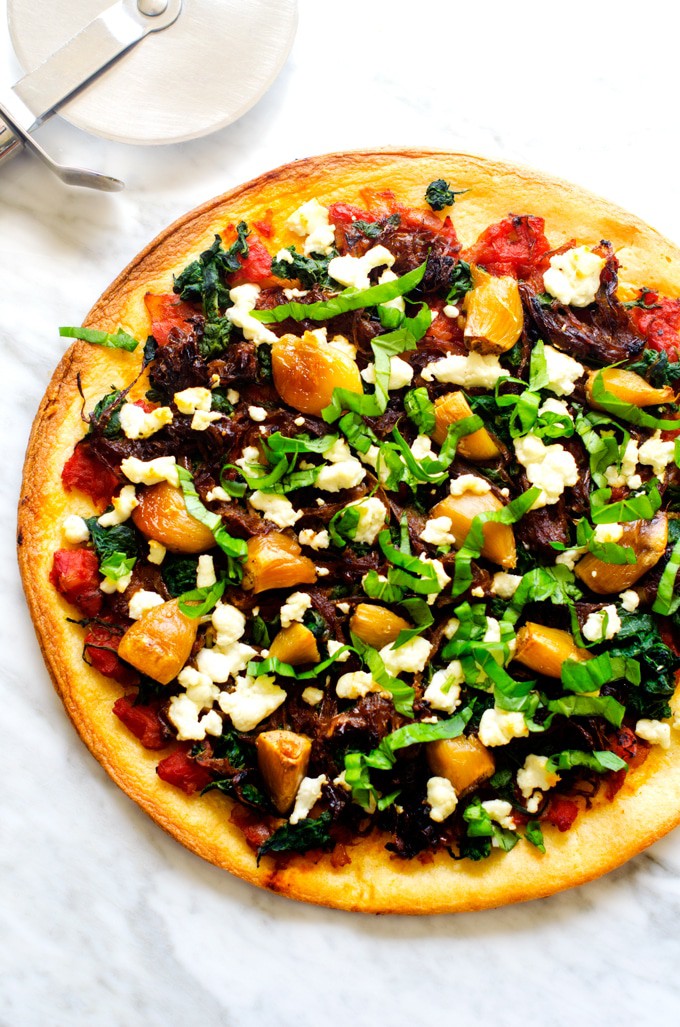 Caramelized Onion, Roasted Garlic & Goat Cheese Pizza - This gluten free pizza comes together in a matter of minutes thanks to these easy freezer hacks! #YesYouCan - Vegan Option - WendyPolisi.com