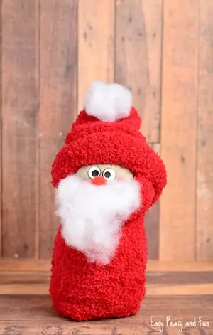 Photo of a no sew sock Santa Craft for kids.