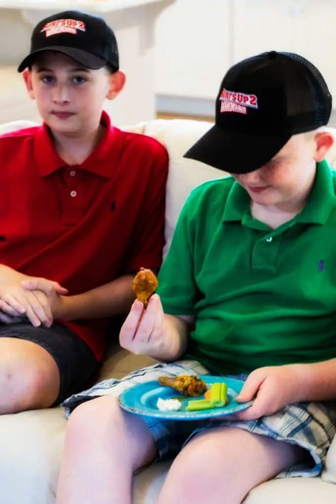 Photo of Boys eating Healthy Oven Baked Chicken Wings