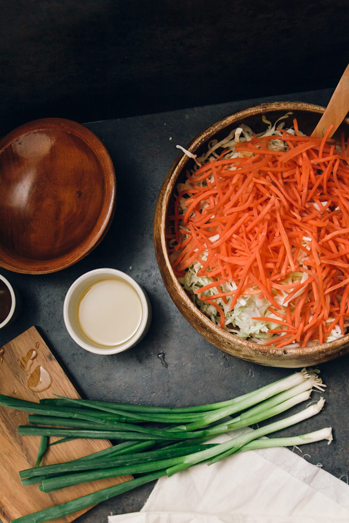 Carrots and cabbage mixed together in a bowl.