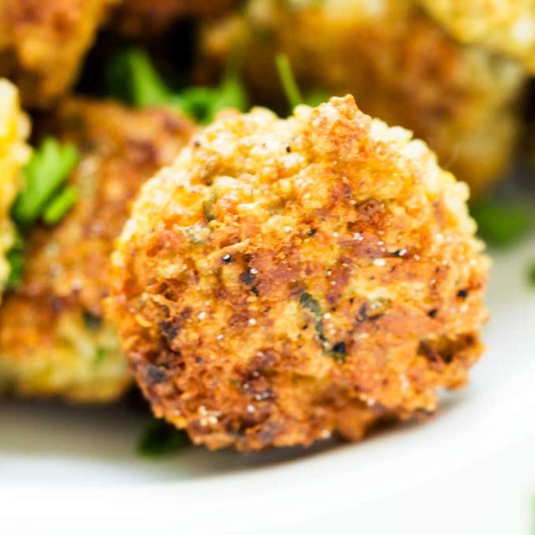 Square close up photo of a quinoa fritter.