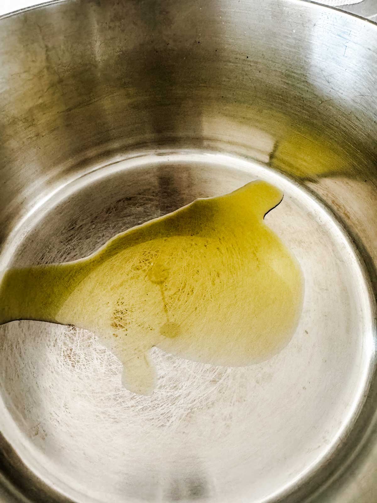 Oil cooking in a saucepan.