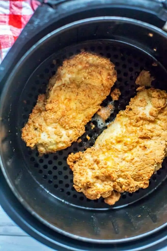 Photo of air fryer fried chicken breast in an Air Fryer.