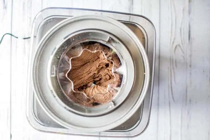 Photo of easy homemade chocolate ice cream in an ice cream maker.