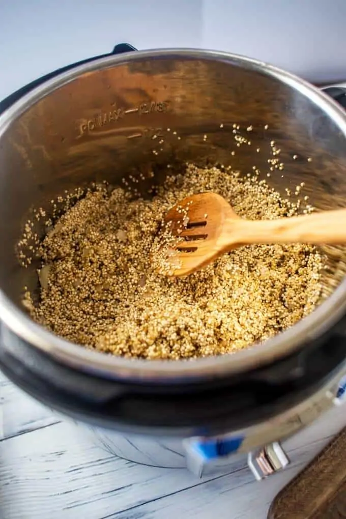 Photo of quinoa toasting in an instant pot.