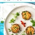Photo of three Vegetarian Stuffed Mushrooms on a white plate with the words Vegetarian Stuffed Mushrooms above.