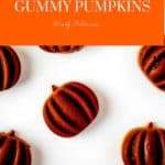 Photo of a prepared gummy recipe with the text Chocolate Gummy Pumpkins above it.