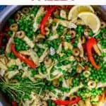 Close up photo of Veggie Paella with the text Veggie Paella in red and green text above it.