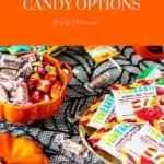 Photo of healthier Halloween candy options on a black and white background with the text 8 Healthier Halloween Candy Options above.
