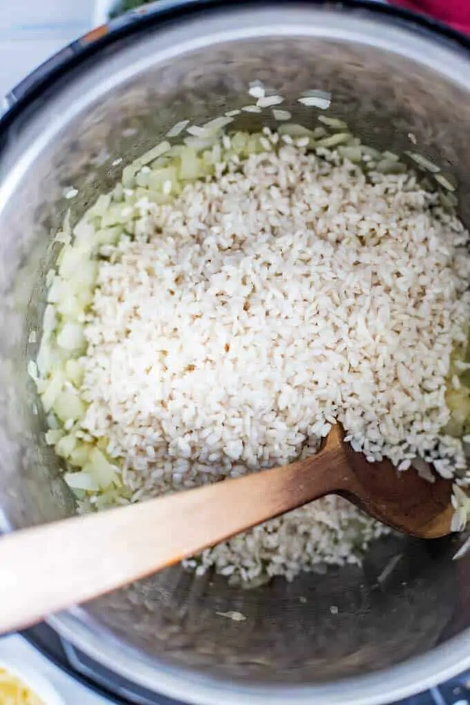Rice being toasted for Instant Pot Risotto.