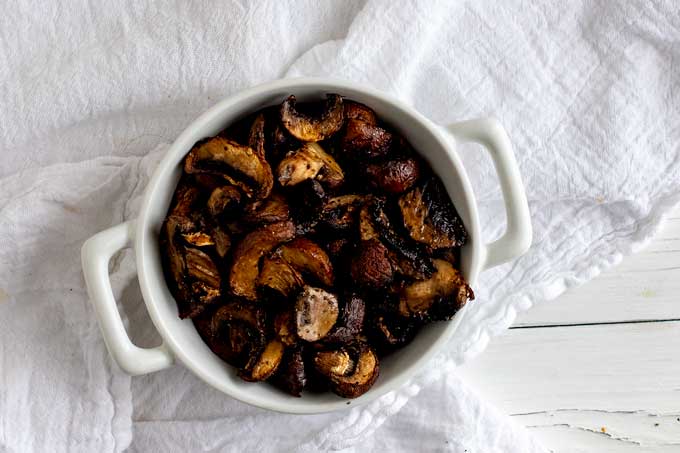 Small white dish of Air Fried Mushrooms.