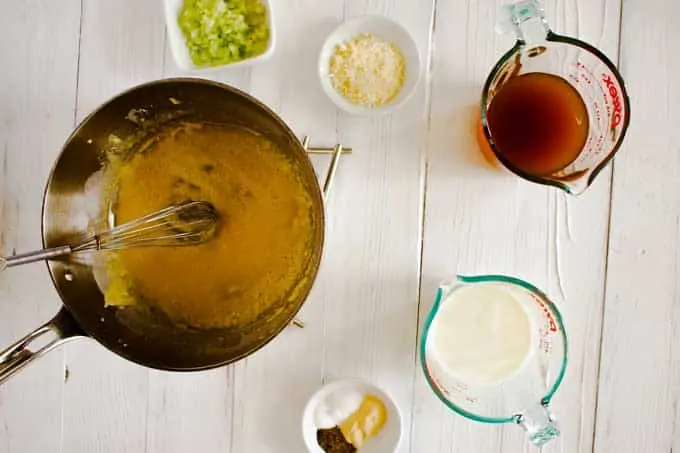Photo of olive oil and flour in a skillet.