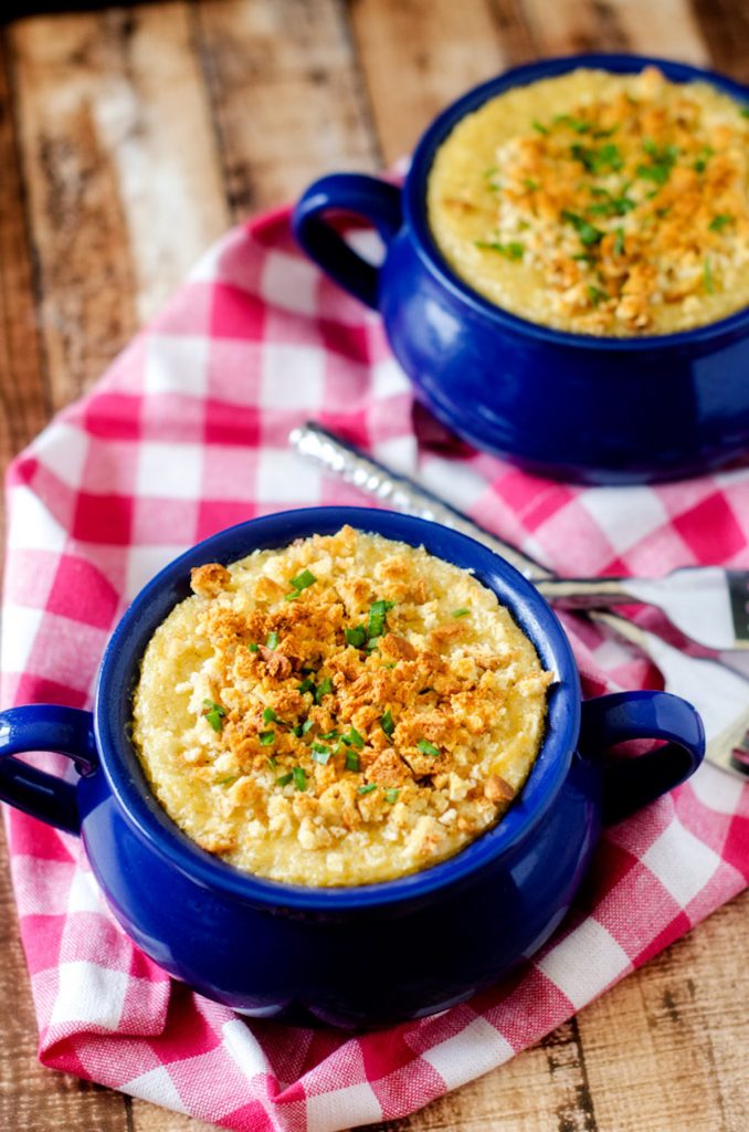 Two blue crocks with quinoa mac and cheese.
