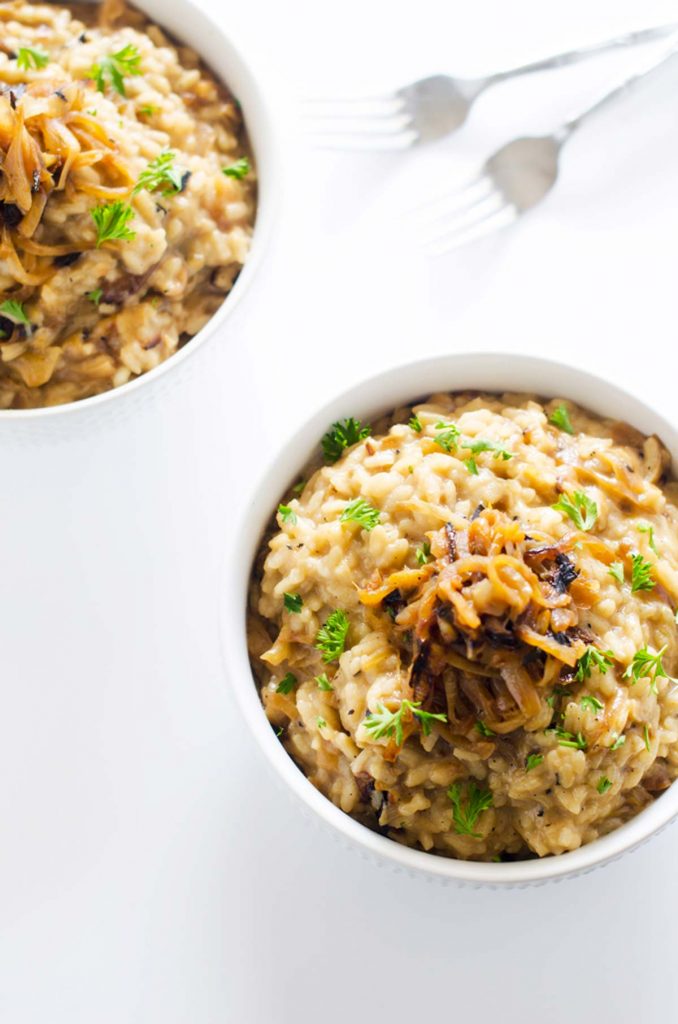 Photo of two bowls of caramelized onion risotto.