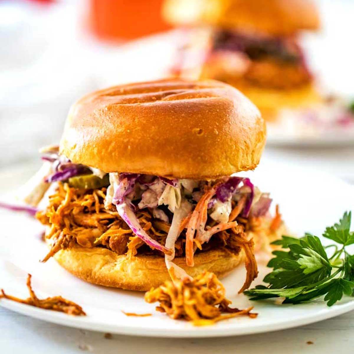 Side photo of a BBQ Chicken Sandwich with slaw.