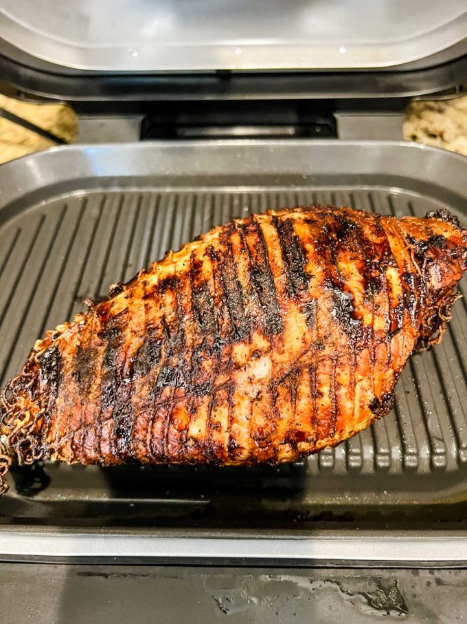 Photo of Ninja Foodi Grill Turkey Breast ready to come off the grill.