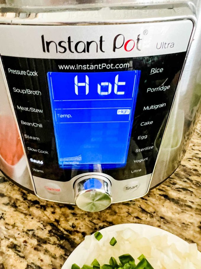 Photo of a preheated Instant Pot on saute