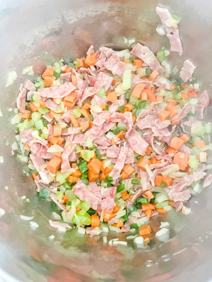 Photo of cooked bacon and vegetables in an Instant Pot.