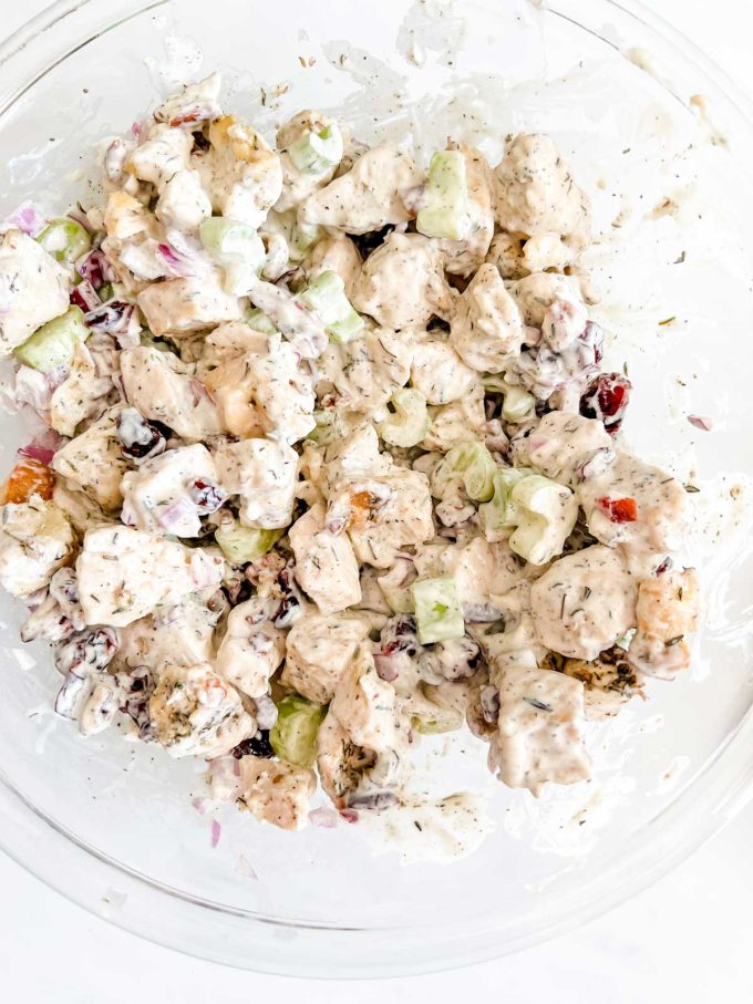 Cranberry chicken salad that has just been mixed together.