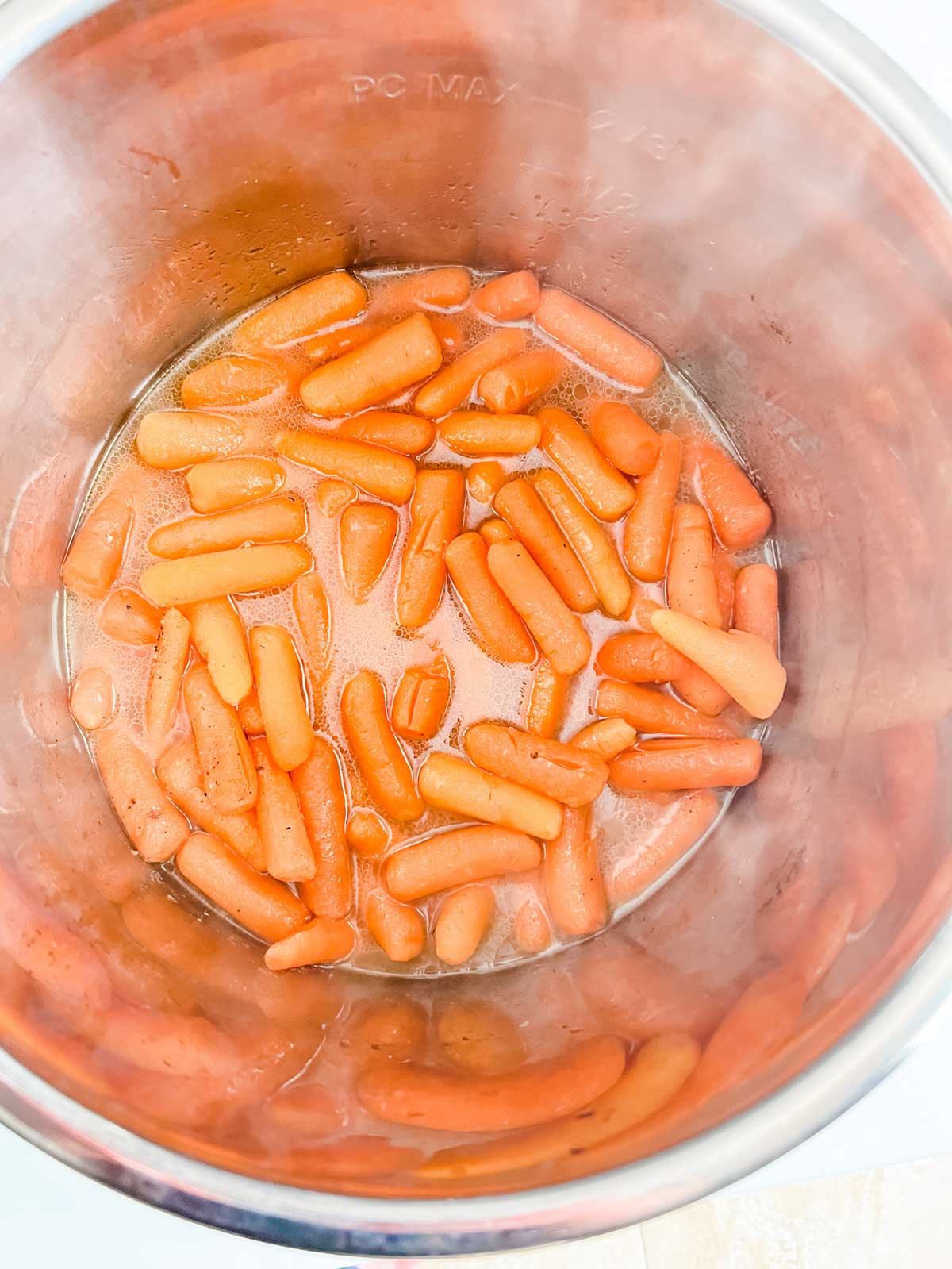 Photo of carrots that have just been cooked in an Instant Pot.