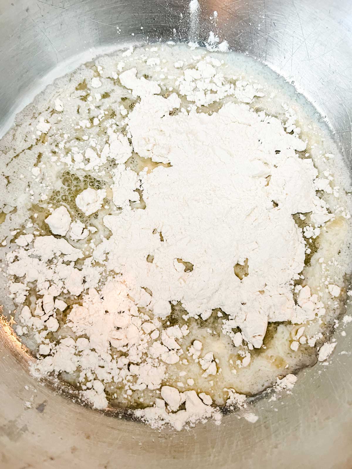 Photo of butter and flour in a saucepan.