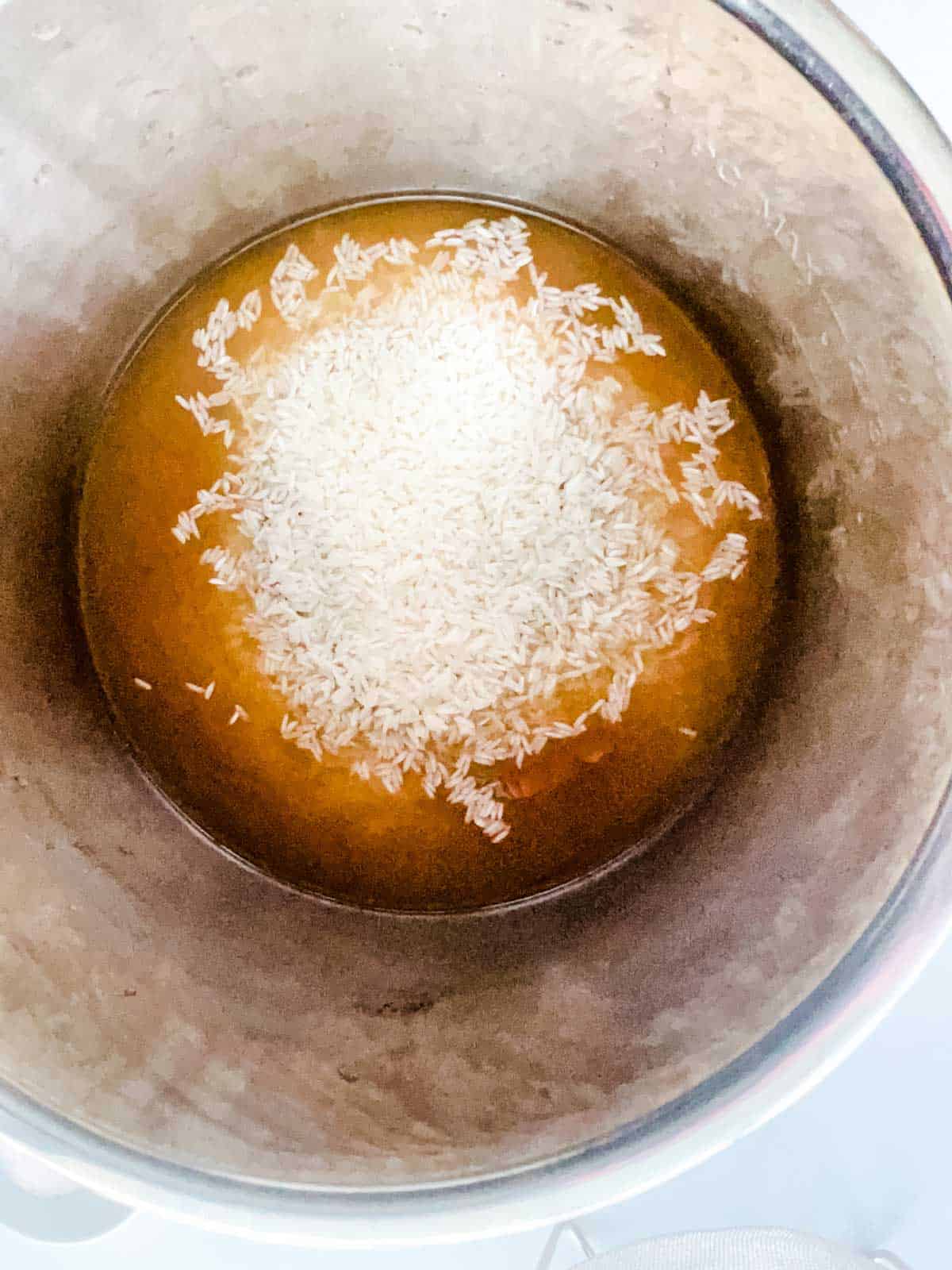 Broth and rice in and instant pot.