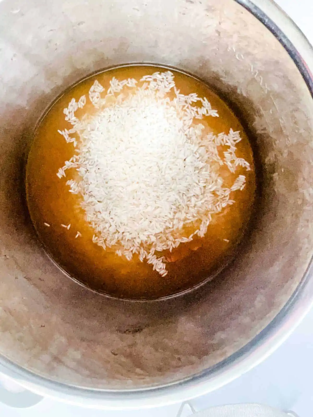 Broth and rice in and instant pot.