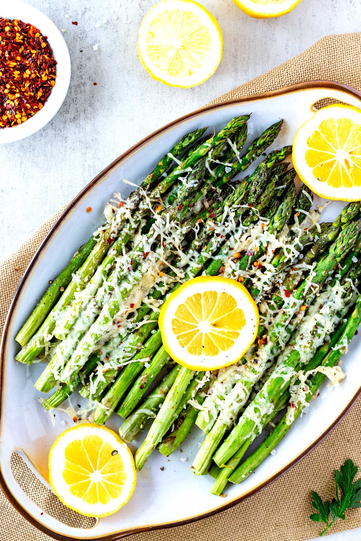 Photo of a platter of Baked Asparagus.