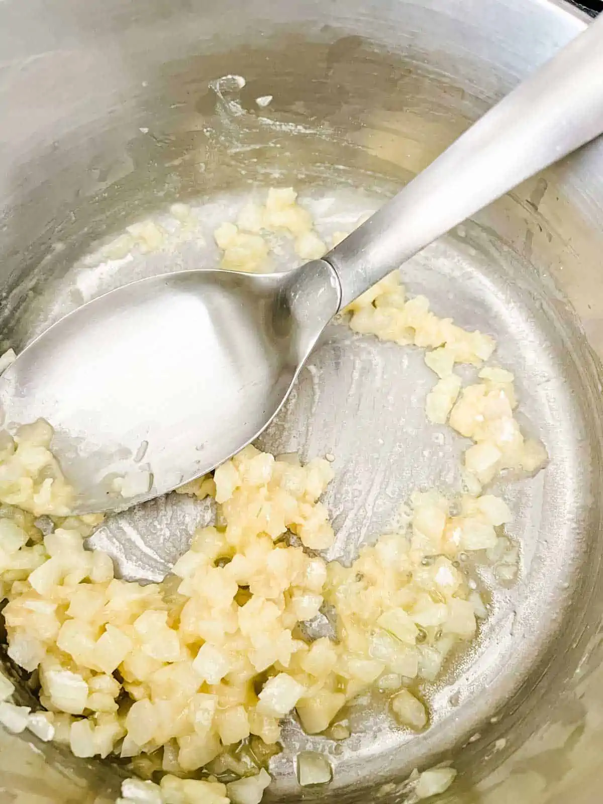 Photo of a butter and onion mixture thickened with flour.