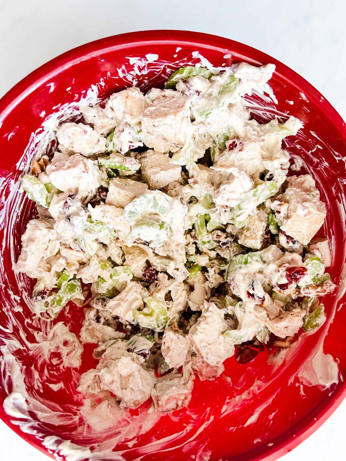 Photo of Greek Yogurt Chicken salad that has been mixed together in a bowl.