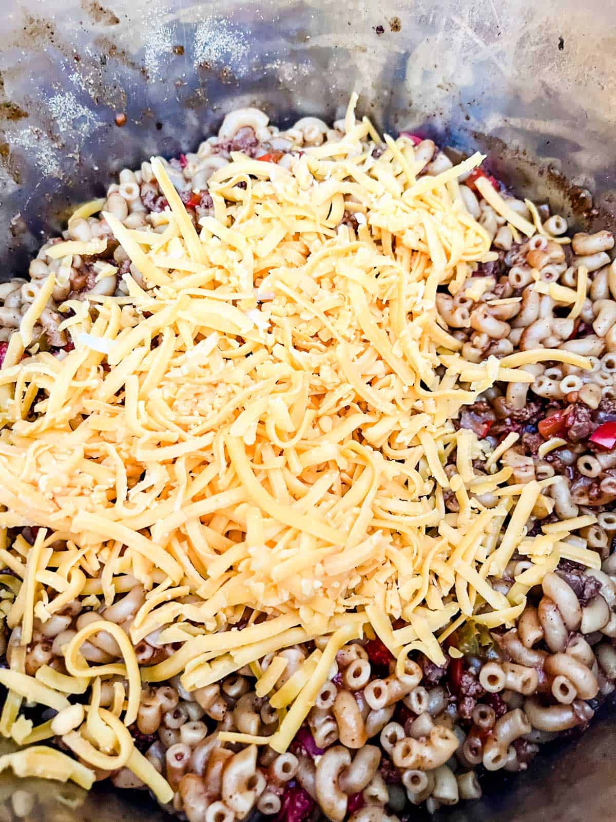 Shredded cheese on top of Instant Pot Chili Mac.
