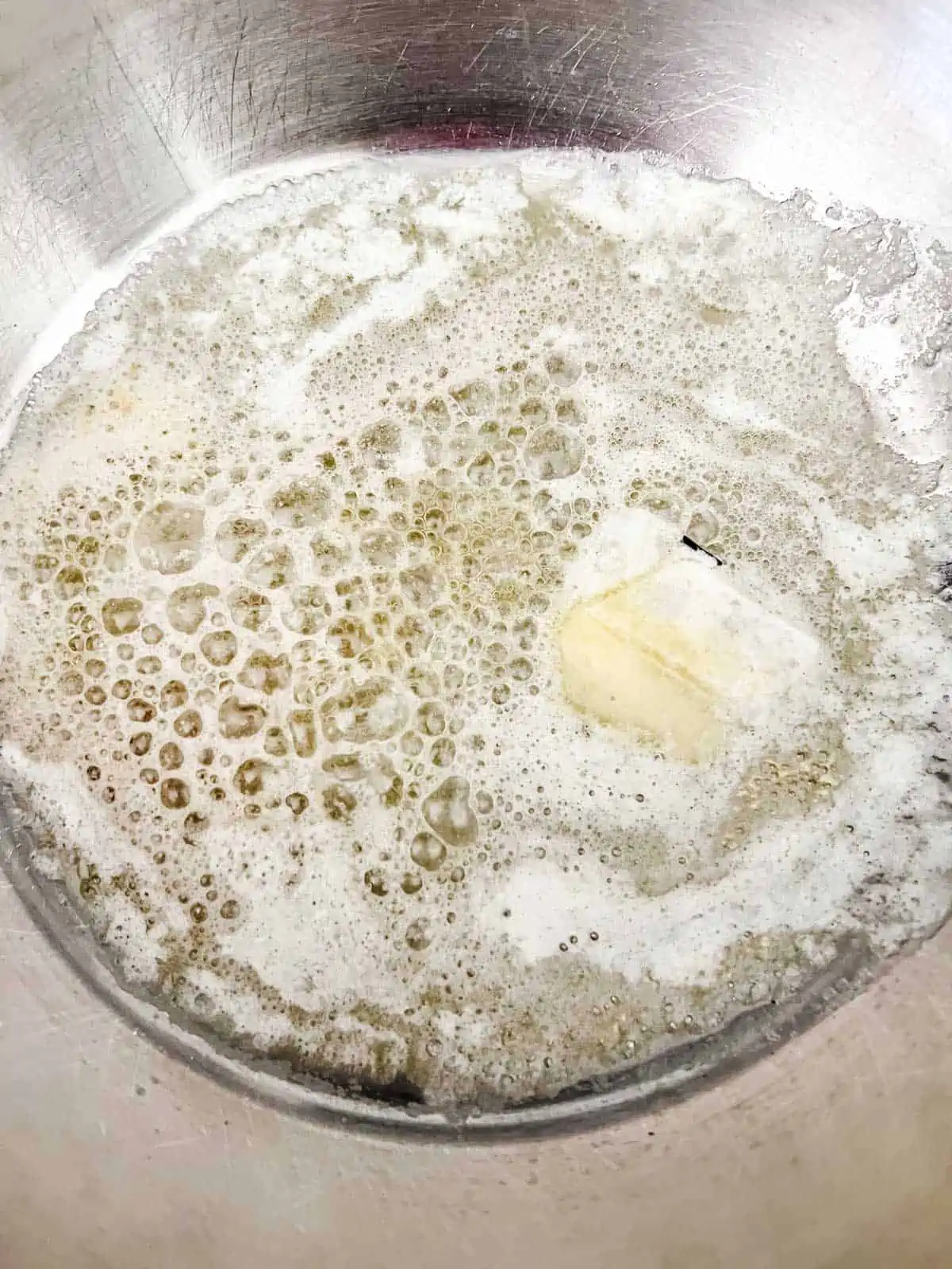 Photo of melted butter in a skillet.