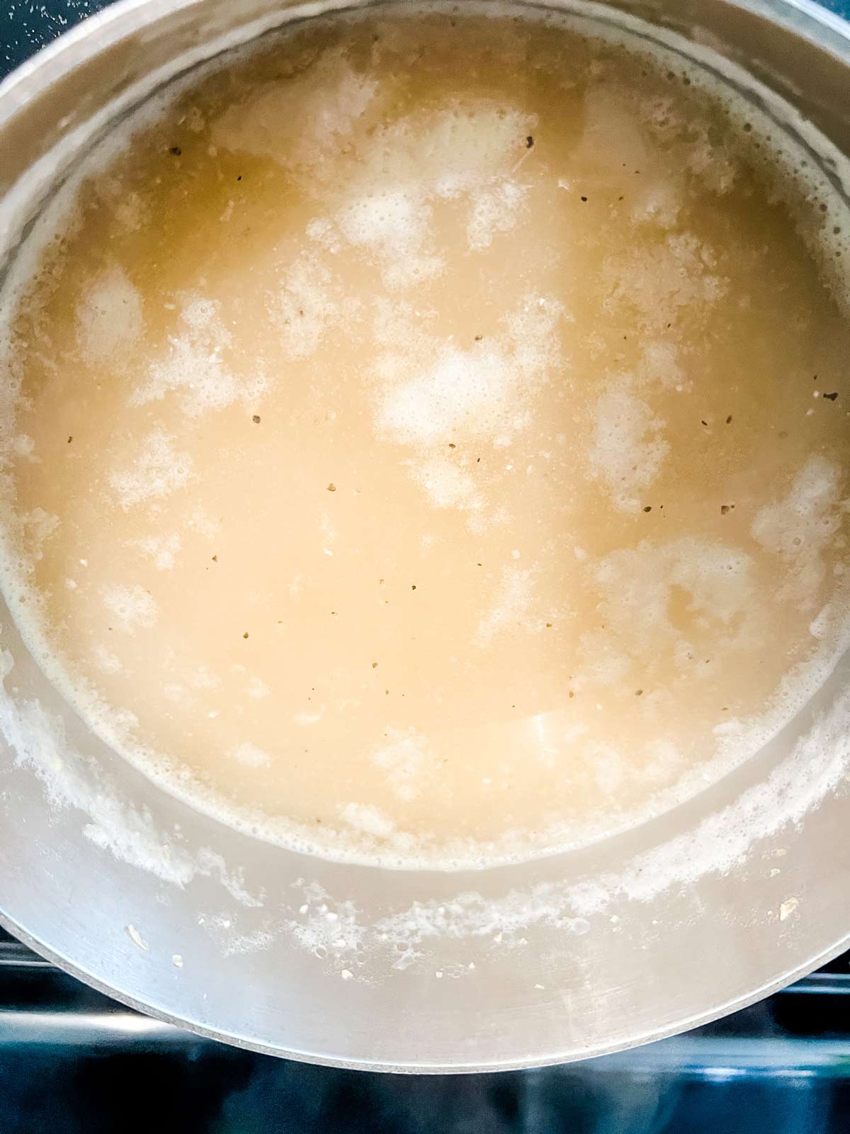 Grits cooking in water.