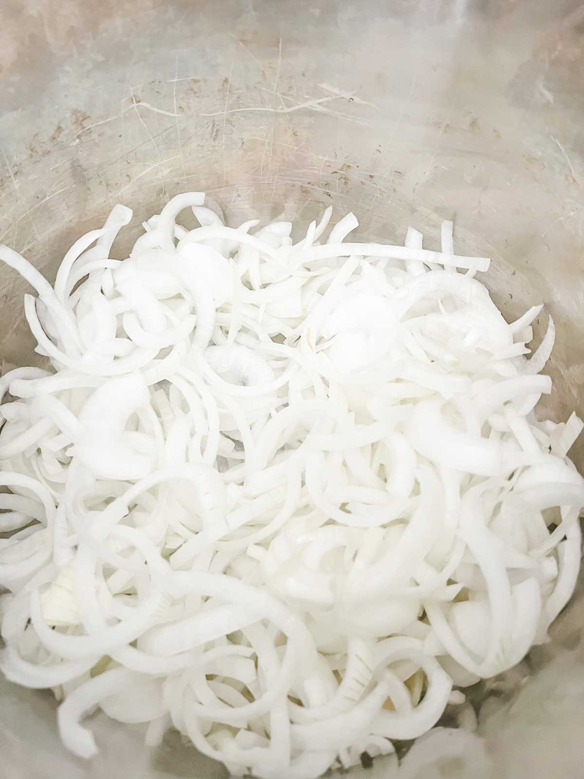 Photo of onions cooing in an Instant Pot.