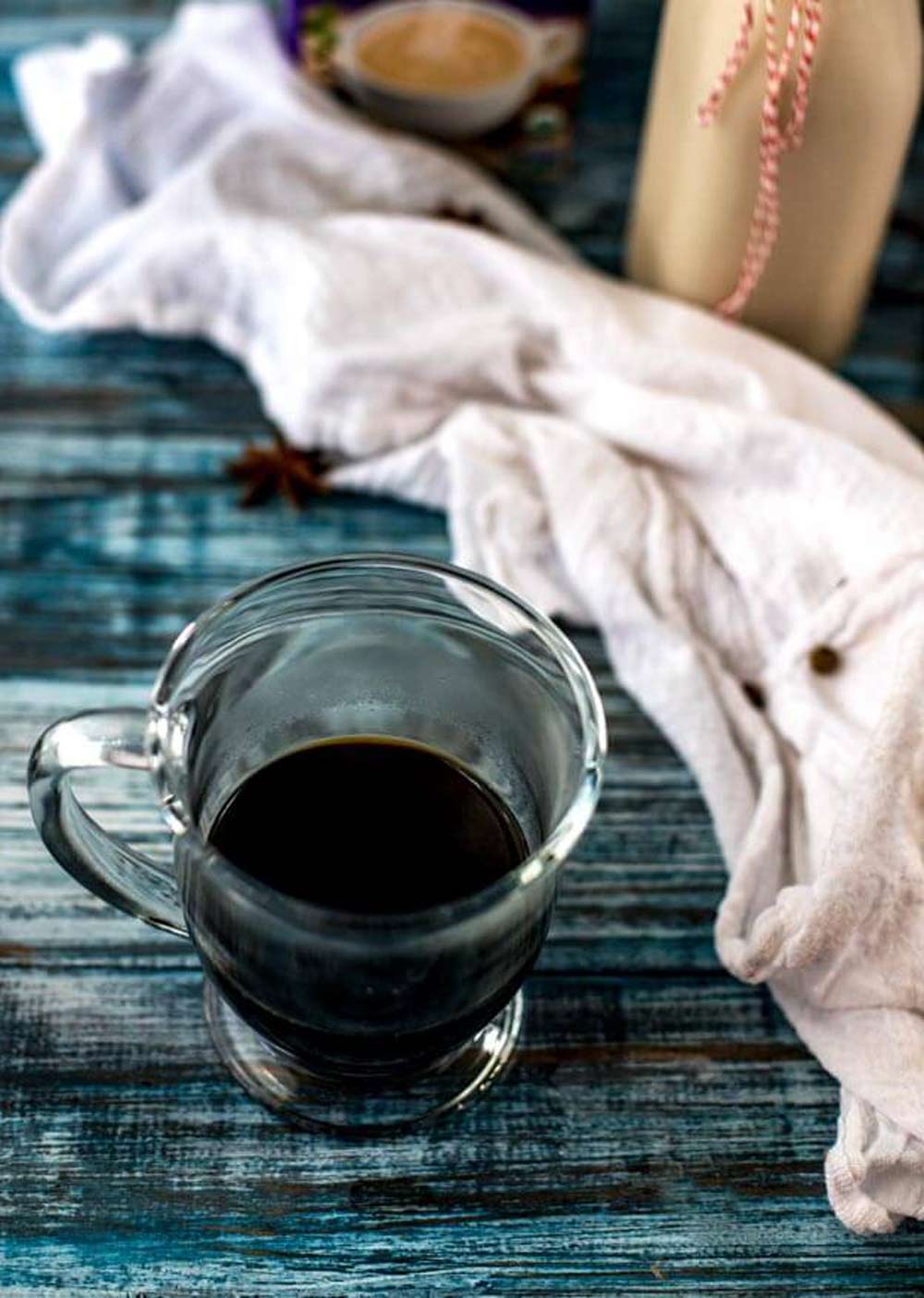 Photo of espresso in a glass mug.
