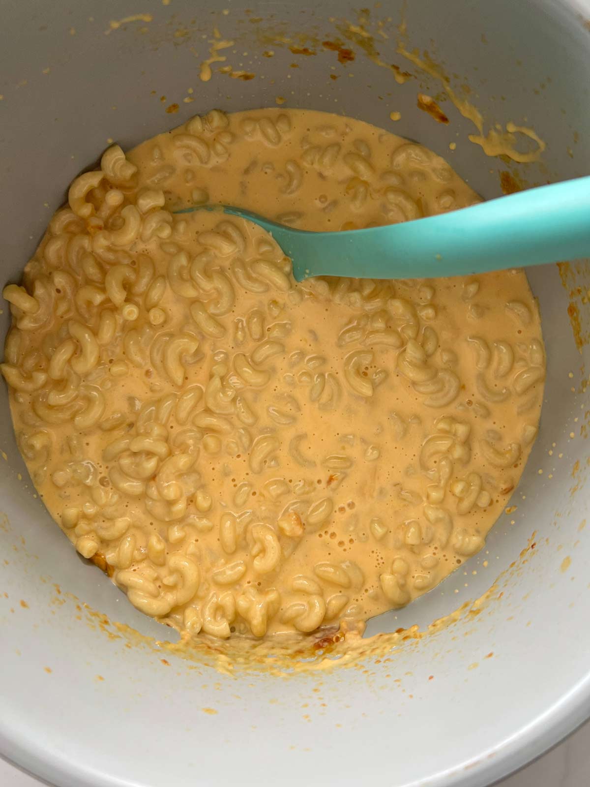 Creamy mac and cheese in the inner pot of a Ninja Foodi.