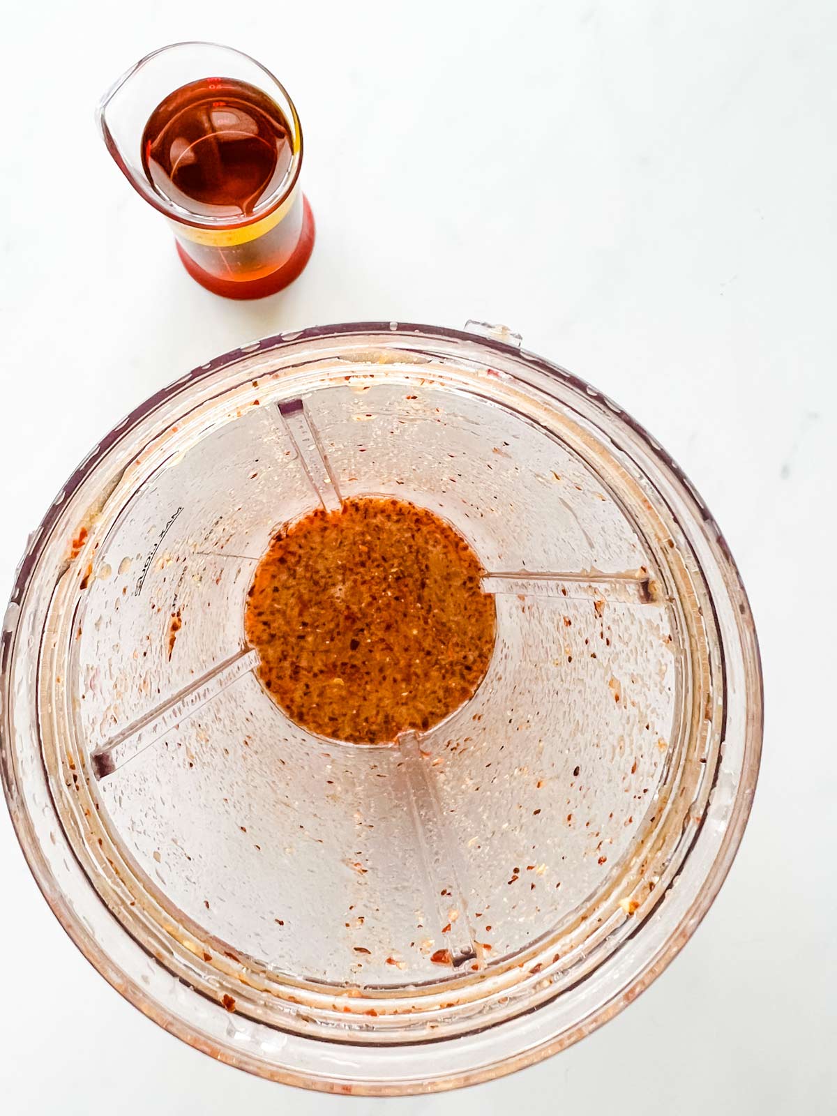 Mixed lime juice, fish sauce, ginger, and red pepper flakes in a blender.