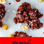 Overhead photo of peanut clusters on a white background with the text crockpot peanut clusters surrounding it.