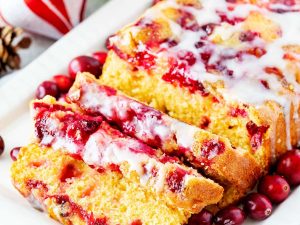 Close up photo of cranberry bread with glaze.
